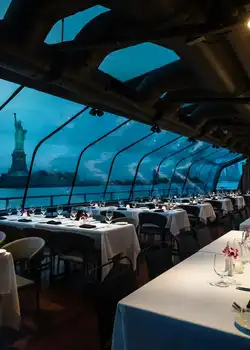 Enjoy a luxurious dinner cruise with stunning NYC views. Best Activities to Visit New York in 2025.
